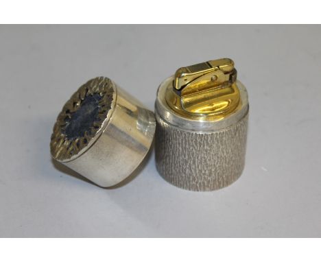 A DAVID DEAKIN SILVER CASED LIGHTER.