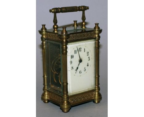 A 19TH CENTURY FRENCH BRASS CARRIAGE CLOCK.  5ins high.