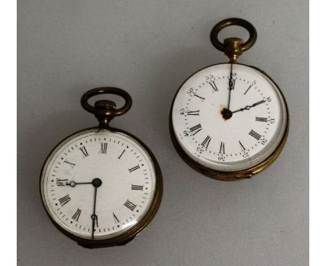 TWO SMALL VICTORIAN WATCH PURSES with gold and enamel backs.