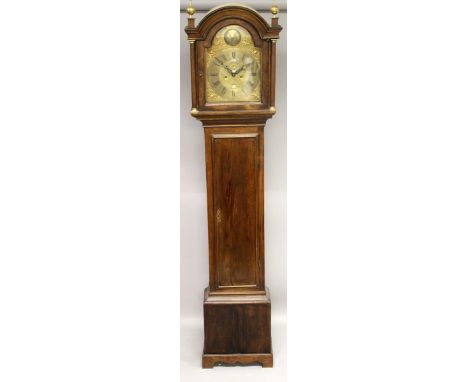 A GEORGE III OAK EIGHT DAY LONGCASE CLOCK, with arched brass dial, brass chapter ring, subsidiary seconds dial (hand lacking)