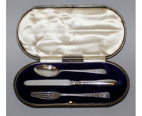 A CHRISTENING KNIFE, FORK AND SPOON with bright cut decoration in a fitted case. Birmingham 1911.