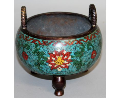A GOOD CHINESE CLOISONNE ENAMEL CIRCULAR TWO HANDLED CENSER, light blue ground with scrolls and flowers, supported on three c