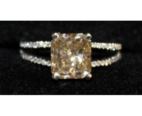 A SUPERB NATURAL YELLOW DIAMOND SINGLE STONE RING, approx 3.15cts, set in 18ct white gold.