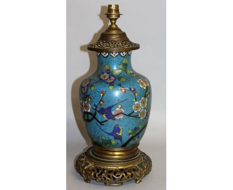 A 19TH CENTURY JAPANESE BLUE GROUND CLOISONNE ENAMEL LAMP with ormolu mounts and base. 16ins high.