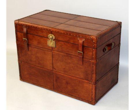 A GOOD LARGE LEATHER TRUNK, with rising top, lift out tray and carrying handles. 3ft 0ins wide x 2ft 3ins high.