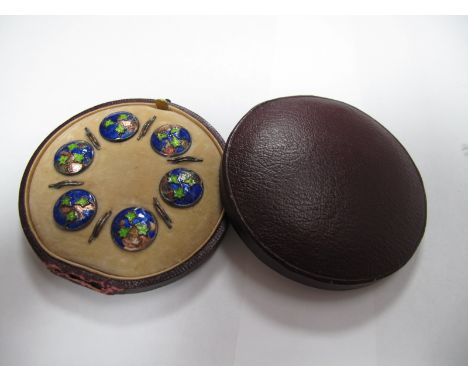 A Set of Six Sterling Silver Buttons, enamelled with ivy leaves on deep blue grounds, cased.