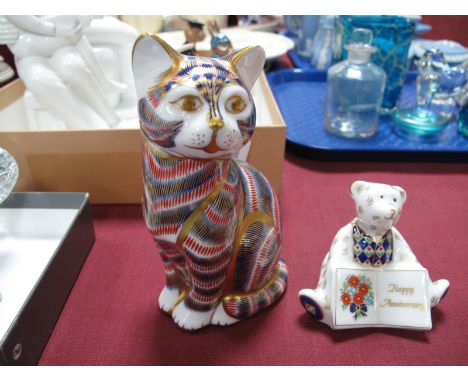 Royal Crown Derby Imari cat, with a silver seal; together with a Royal Crown Derby Happy Anniversary Teddy Bear. (2)