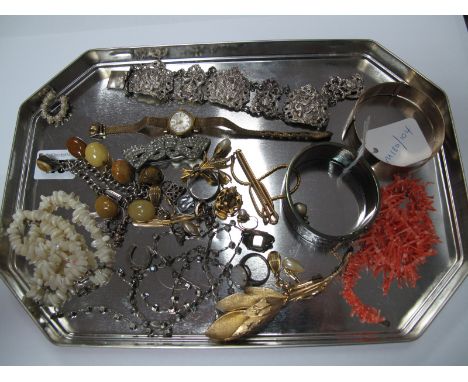 A Hallmarked Silver Bangle, foliate engraved; together with a panel bracelet (damaged), twig coral necklace, engine turned ex