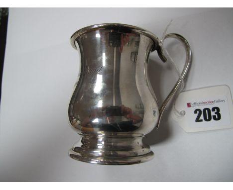 A Hallmarked Silver Christening Mug, of waisted form with loop handle, Birmingham 1944.