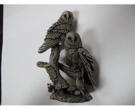 A Modern Hallmarked Silver Filled Model of Two Owls, perched on branches, 16cm high.