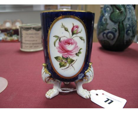 A Royal Worcester Spill Vase, hand painted with a rose, signed E. Phillips, raised on three paw feet (one repaired), 10.6cm h