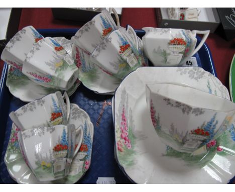 A Shelley China Part Coffee Service, decorated in the 'My Garden' pattern with hollyhocks and roses, Queen Anne shape, compri