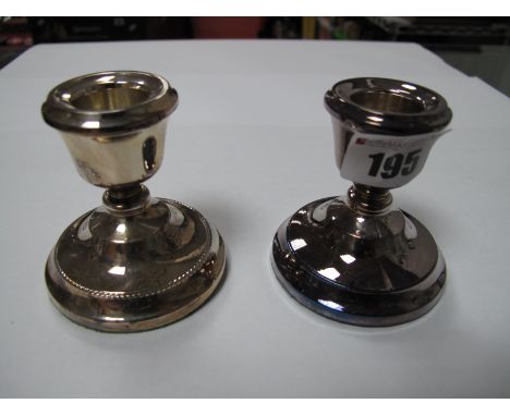 A Hallmarked Silver Dwarf Candlestick, Birmingham 1976; together with another similar, Birmingham 1973. (2)