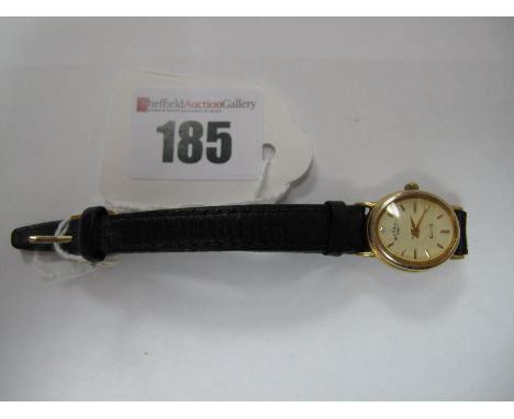 Rotary Elite, A Modern 9ct Gold Cased Ladies Wristwatch, on a strap.