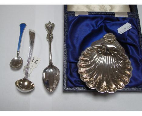 A Hallmarked Silver Shell Dish, in a William Adams fitted case; together with a part hallmarked silver ladle spoon, a decorat