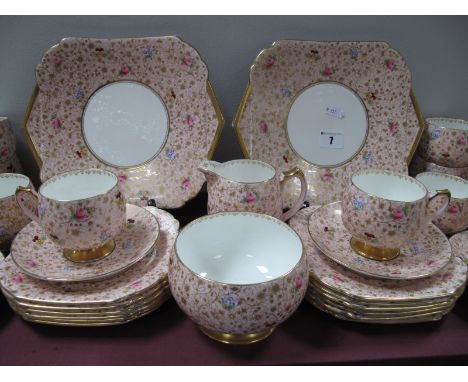 A Shelley Chintz Tea Service, pattern number H12609/55, Kent shape cups, decorated with pink roses, pansies and forget-me-not