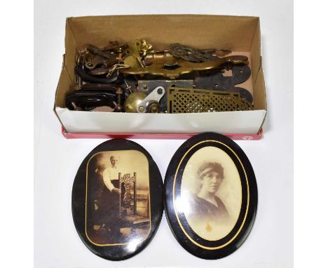 A collection of 19th century and later clock and furniture keys, brass door plates, printed photographs, etc.