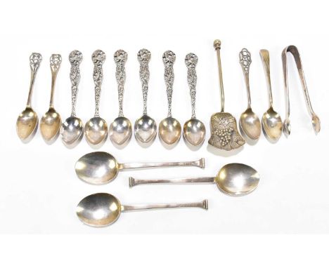 Five assorted hallmarked silver teaspoons of various styles, dates and makers, with a pair of sugar tongs, combined weight 4.