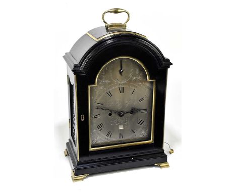 RICHARD YOUNG, LONDON; an 18th century ebonised bracket clock with brass swan neck handle above the arched top and silvered d