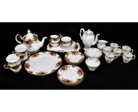 ROYAL ALBERT; 'Old Country Roses' part tea service including five cups and teapot, also a Crown China 'Marylebone' coffee ser