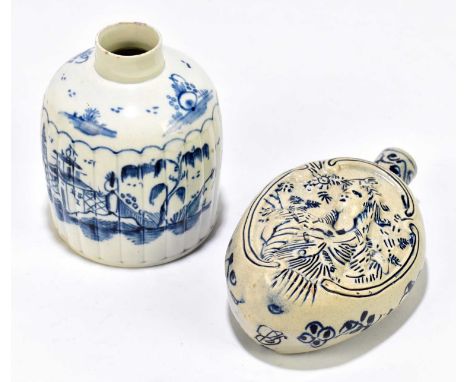 An 18th century Creamware tea caddy of squat circular form with moulded panel detail of buildings in landscape, height 10cm, 