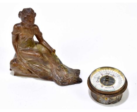 An Art Nouveau bronzed spelter figure representing a maiden wearing flowers in her hair supporting an aneroid barometer (af).