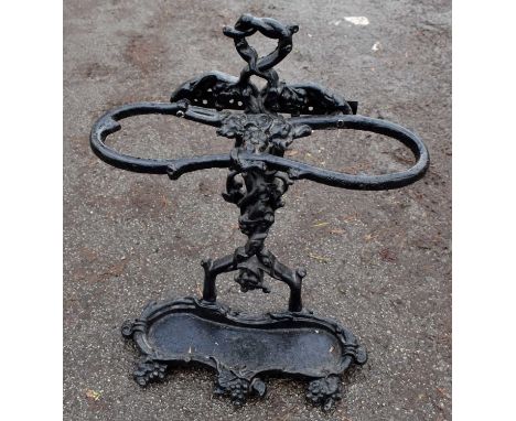 A black painted cast iron stick stand, height 61cm.