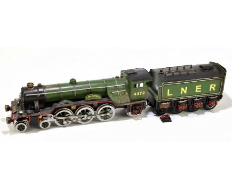 A modern painted metal model of the Flying Scotsman and tender, length 70cm.