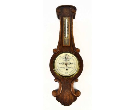 SHORT &amp; MASON, LONDON; an oak wheel barometer of small proportions, height 61cm.