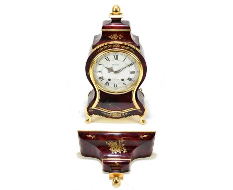 ELUXA; a modern Swiss Louis XV style eight day mantel clock, the enamel dial with Roman numerals, signed Bucherer Trianon, th