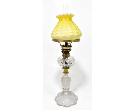 ST LOUIS; a frosted and cut glass oil lamp, the moulded yellow shade of tapering form above a cut glass reservoir and the fro