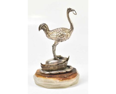 A 19th century novelty hallmarked silver cover finial modelled as an ostrich holding a horseshoe, model standing upon a crown