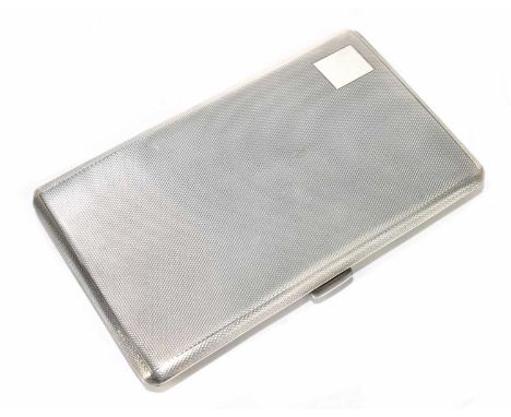 FREDERICK FIELD; an Elizabeth II hallmarked silver cigarette case of rectangular form with engine turned decoration surroundi