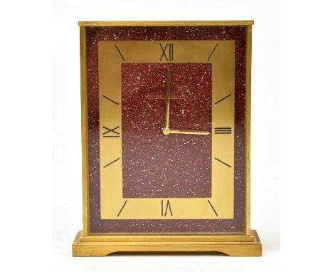  JAEGER LECOULTRE; a gilt brass and rouge marble mantel time piece, with Roman numeral chapter ring, the underside numbered 5