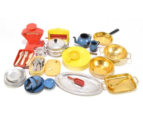 A collection of 1950s doll's house furniture including enamel pans, scales, etc.