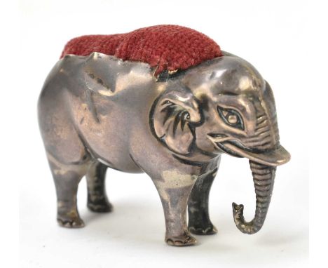 ADIE &amp; LOVEKIN; an Edwardian hallmarked silver pin cushion modelled as an elephant, Birmingham 1905, length 6cm.General l