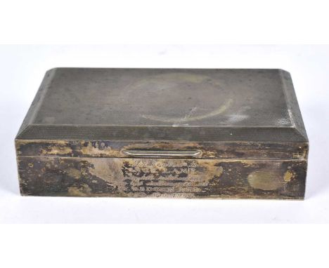 ALEXANDER CLARKE LTD; an Elizabeth II hallmarked silver cigarette box of rectangular form, the cover with engine turned decor