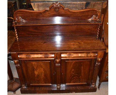 A Victorian mahogany chiffonier, with shelved back above cushion drawers and pair of panel doors, width 137cm.