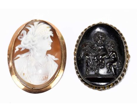 A yellow metal mounted cameo brooch representing portrait bust of a maiden wearing flowers in her hair, the mount is unmarked