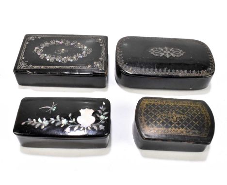 Three Victorian papier-mâché snuff boxes to include an example with wire and jewelled detail, width 7cm, together with a furt