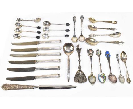 A group of Continental silver and white metal souvenir spoons, some with enamel detail, approx. 6.30ozt/187.5g, also a silver