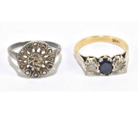 A yellow metal three stone ring, set with two white stones and a blue stone, stamped 18ct, size N, weight 3.8g, and a marcasi