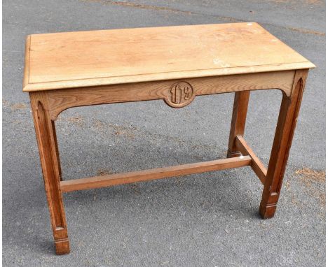 A pitch pine altar table with applied panel, to the memory of Shirley Birtwistle, width 105cm, depth 55cm, height 82cm.