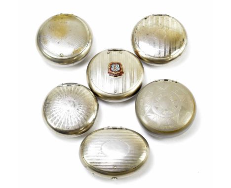 Six chrome and pewter circular and oval squeeze snuff boxes to include an example with applied enamel city crest for Brighton