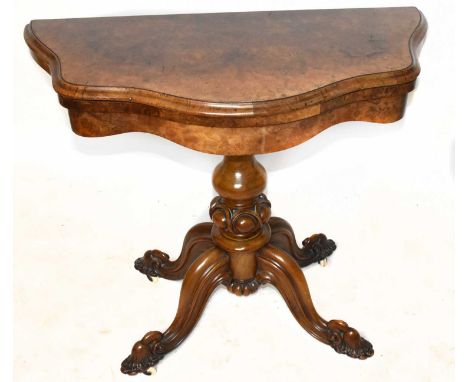 A Victorian walnut serpentine card table, width 94cmWidth 93cm. Folded out 97cm diameter. Height 75cm. When folded depth is 4