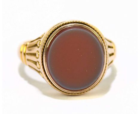 A Victorian gentleman's 15ct yellow gold signet ring, set with hard stone cabochon, hallmarks for Chester 1882, size O 1/2, a