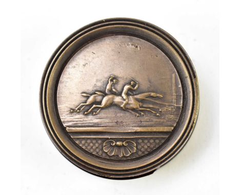A 19th century silver plated and lacquered snuff box of circular form, embossed with jockeys on horseback to the cover and in