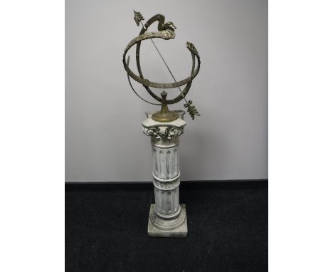 A brass sundial on a concrete column support