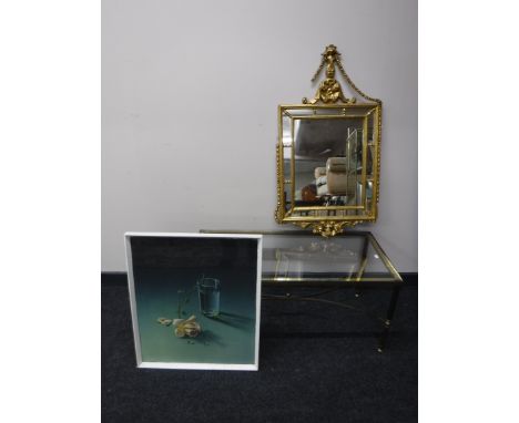 An antique ornate gilt framed mirror (a/f), brass topped coffee table and a frame print "weeping rose" 