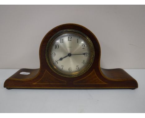 An inlaid mahogany 8 day mantel clock
